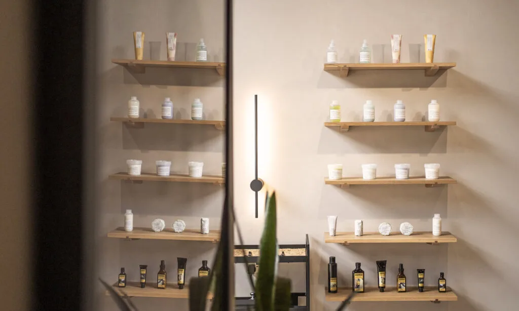9 mosu-hair-space-davines-product-display-worcester - Mosu Hair Space Davines product shelves reflected in salon mirror at mosu hair space
